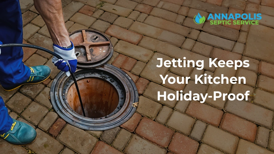 Commercial technician performing grease trap jetting to help restaurants avoid holiday emergencies